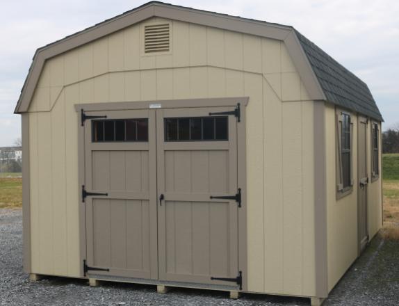 Pine Creek 12x20 New England Dutch Barn with Beige walls, PC Clay trim and PC Clay Z-Style shutters, and Barkwood shingles