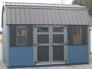 Pine Creek 10x14 HD Dutch Barn with Dark Blue walls, Dark Gray trim and Black Z-Style shutters, and Black metal roof